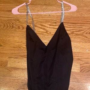 Black body suit with jeweled sleeves